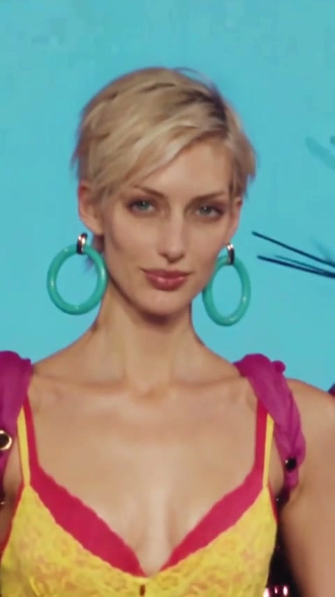 Jasmine Tookes Magenta Fringe Wings
